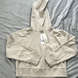 Zara woman’s crop hoodie.